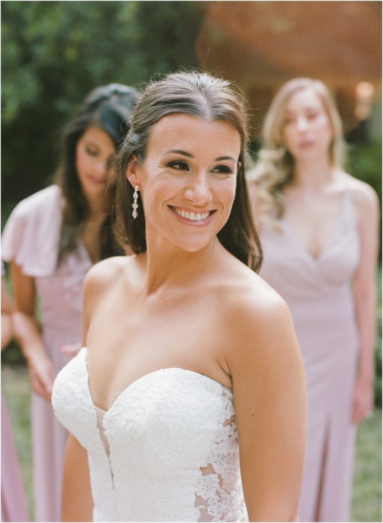 Bride smiling at her Twenty Mile House wedding
