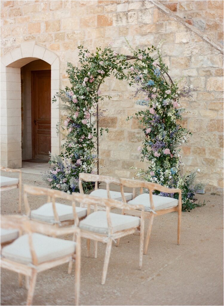 A summer Sunstone Winery wedding drenched in purple clematis